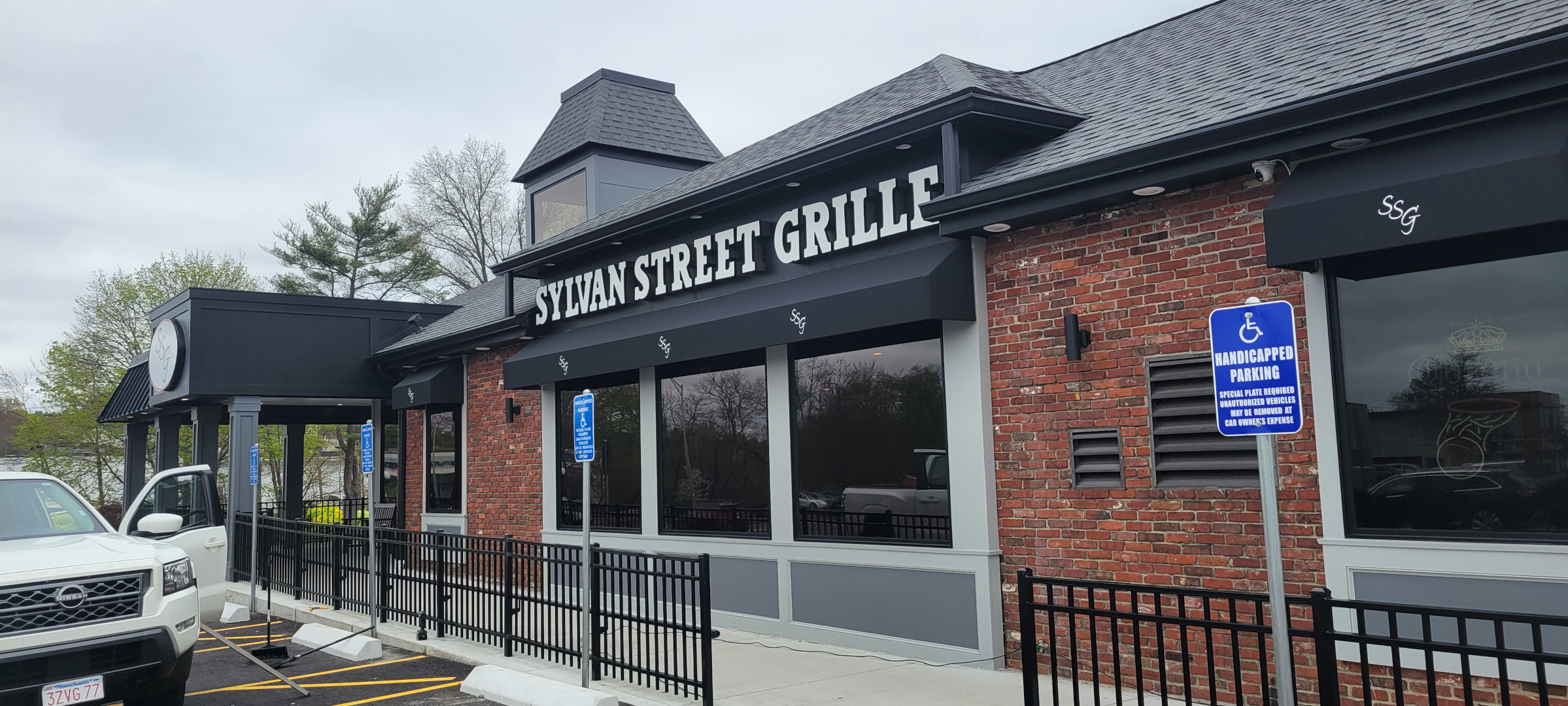 Side shot showing the handicap ramp, as well as the newly constructed entrance at the Sylvan Street Grille